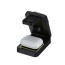 A pair of wireless earbuds is placed in a charging case, and the case is on  a charging dock.